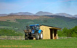 Tractor pulling mobile field shelter